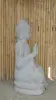 Product image 6 of the product “Seated Buddha with floral carving - Abhaya position. About 68cm length, 42cm width, 100cm height. Natural stone (river stone), stonemasonry ”